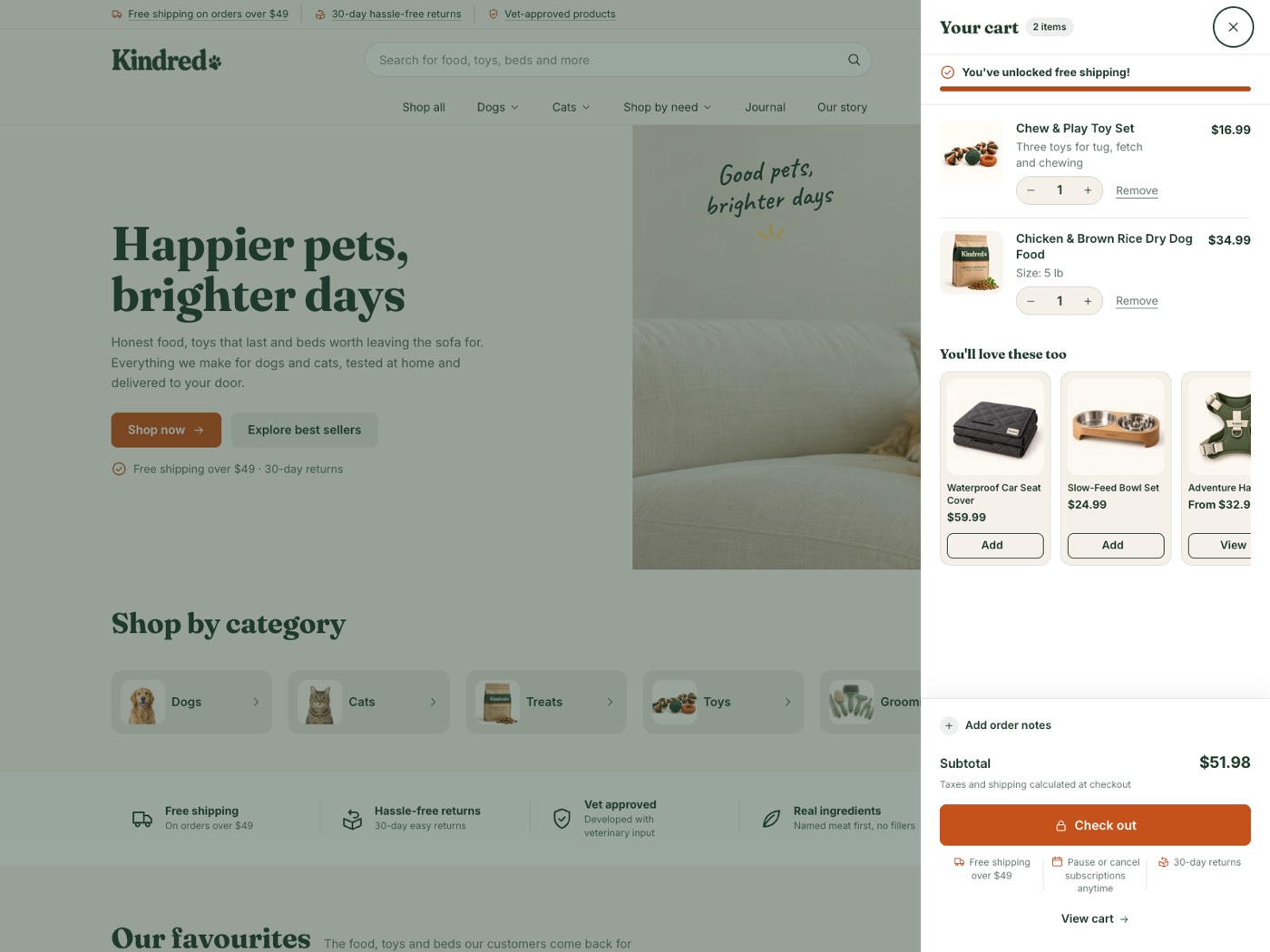 Cart drawer with a free shipping bar, two items, recommendations and trust items under the checkout button